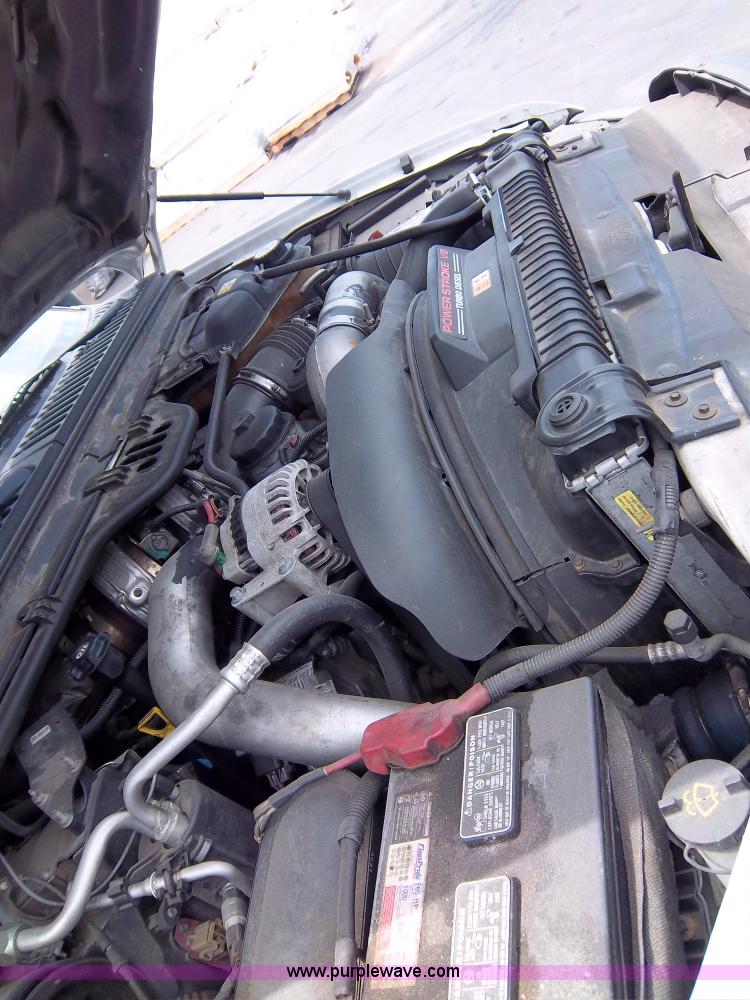 image for item 1000 2004 Ford F450 flatbed truck