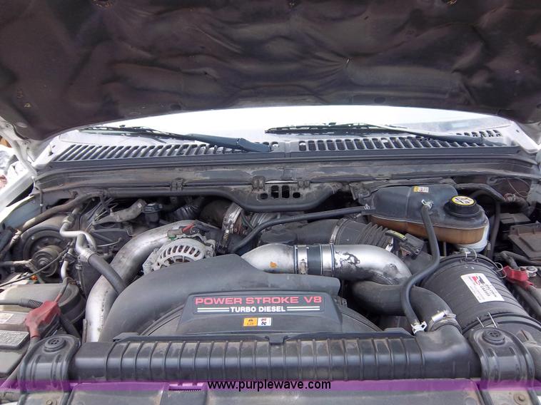 image for item 1000 2004 Ford F450 flatbed truck