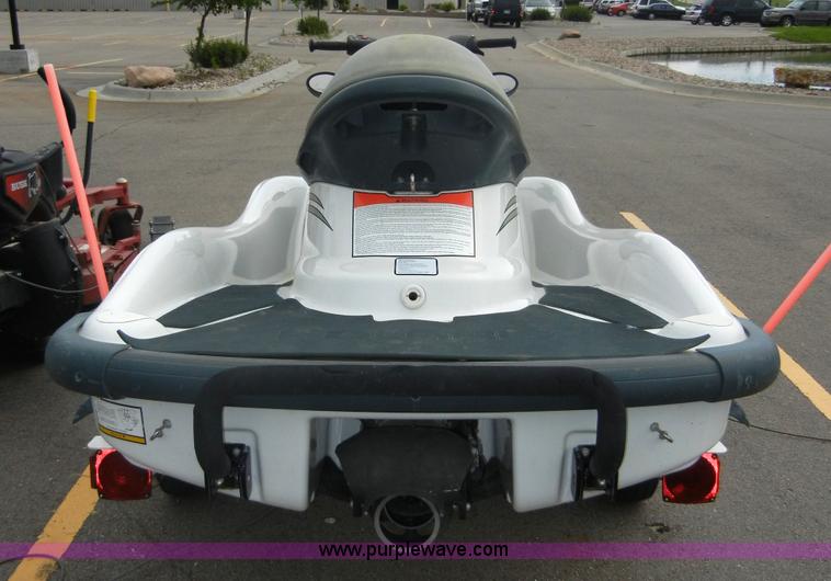 image for item 2364 1999 Polaris Genesis jet ski with trailer