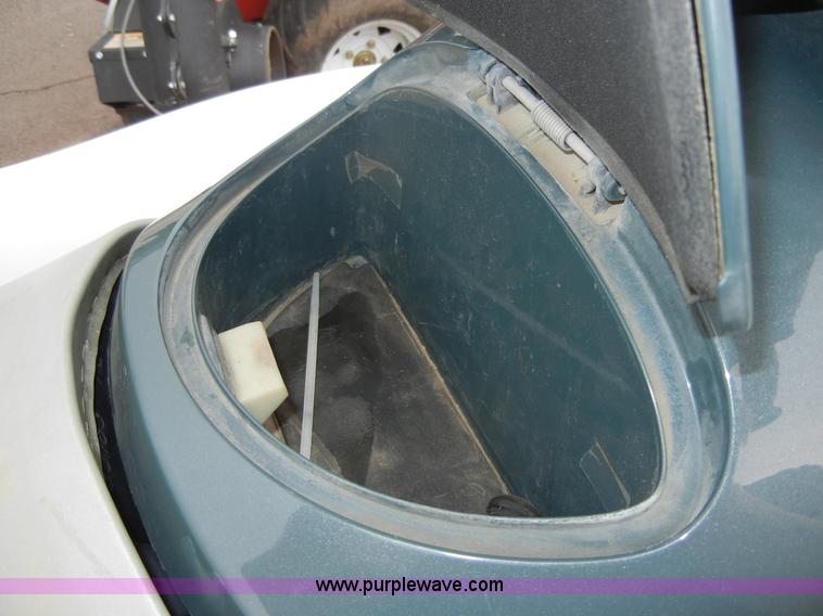 image for item 2364 1999 Polaris Genesis jet ski with trailer