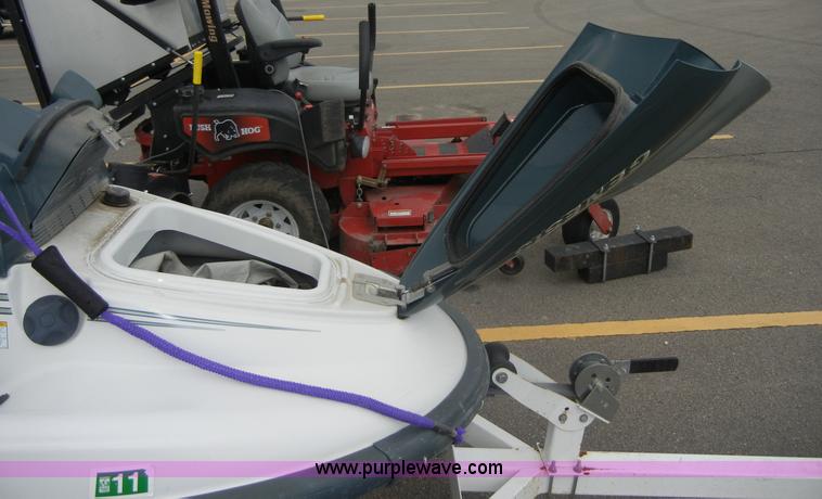 image for item 2364 1999 Polaris Genesis jet ski with trailer