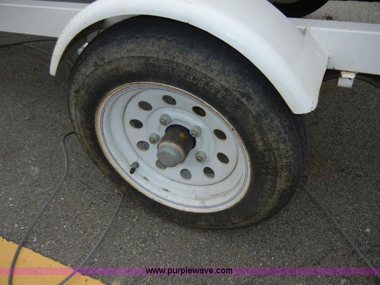 image for item 2364 1999 Polaris Genesis jet ski with trailer