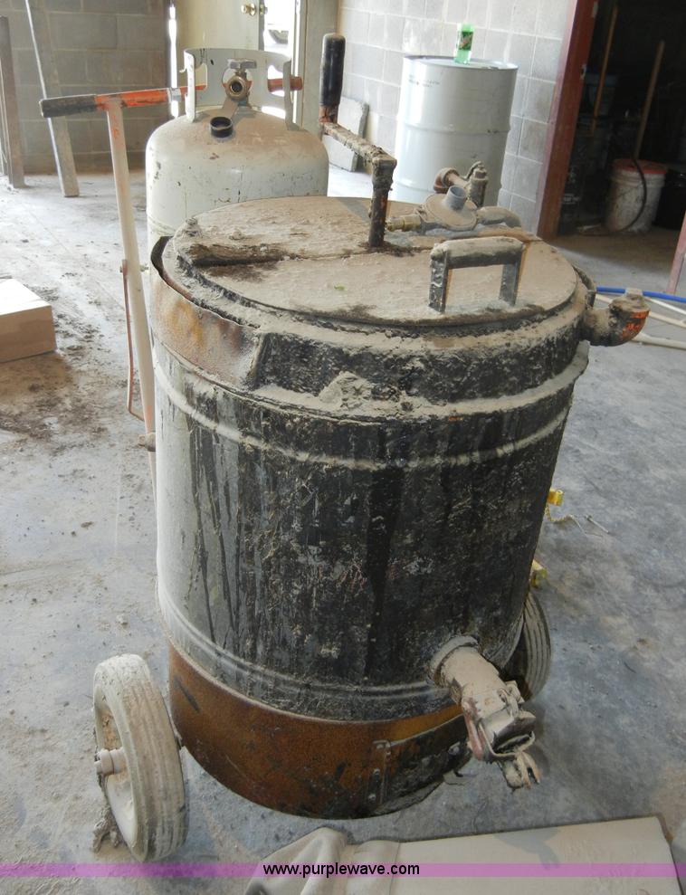 Hot tar pot in Burlingame, KS Item 2169 sold Purple Wave