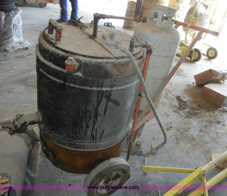 Hot tar pot in Burlingame, KS Item 2169 sold Purple Wave