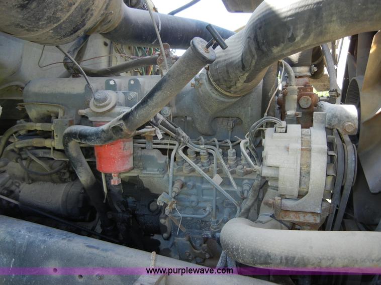 image for item 2356 1992 Ford LT8000 flatbed semi truck