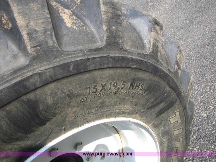 image for item 3444 2006 New Holland TC30 MFWD tractor