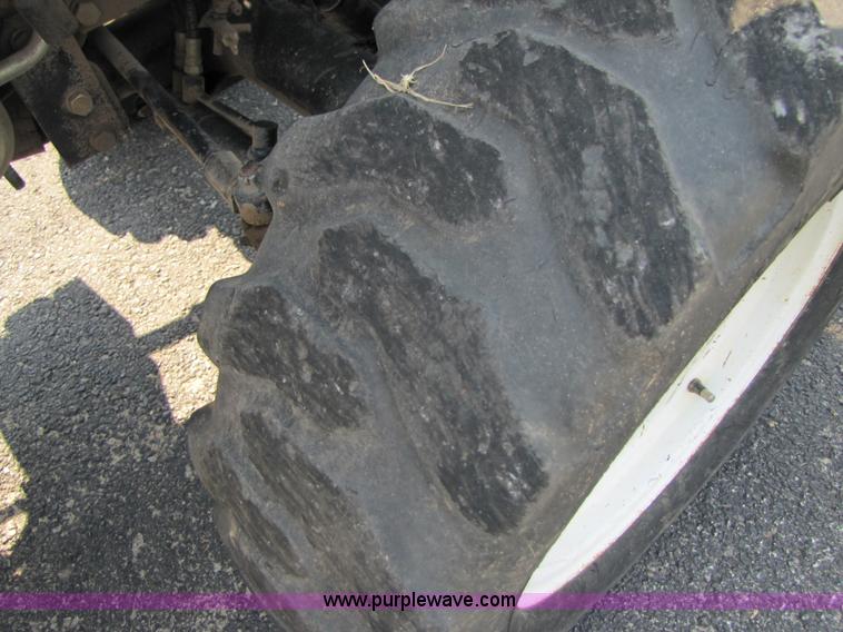 image for item 3444 2006 New Holland TC30 MFWD tractor