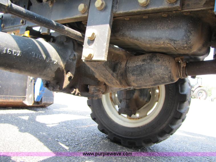 image for item 3444 2006 New Holland TC30 MFWD tractor