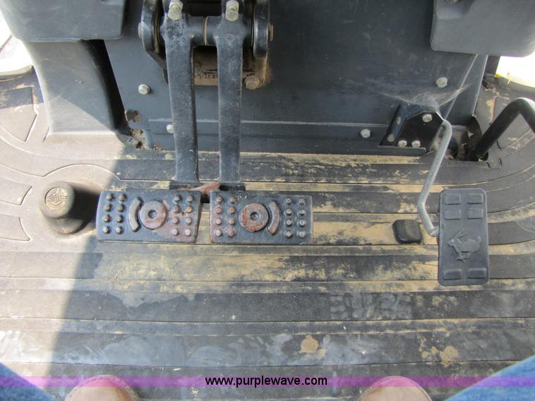 image for item 3460 2002 John Deere 310SG backhoe