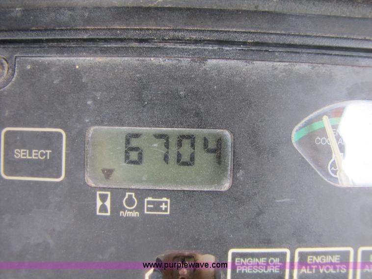 image for item 3460 2002 John Deere 310SG backhoe