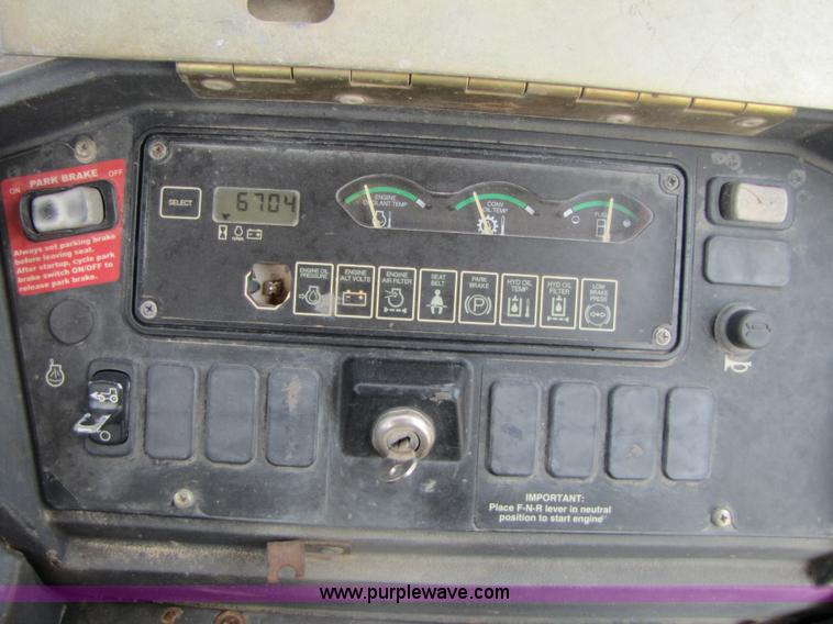 image for item 3460 2002 John Deere 310SG backhoe