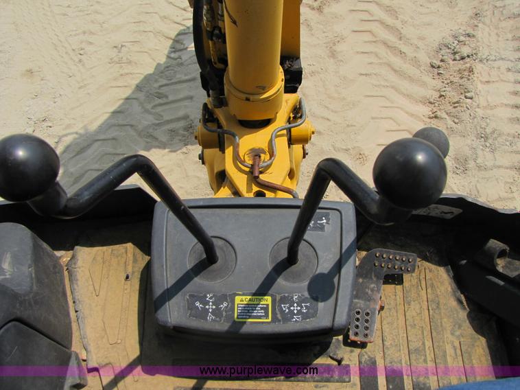 image for item 3460 2002 John Deere 310SG backhoe