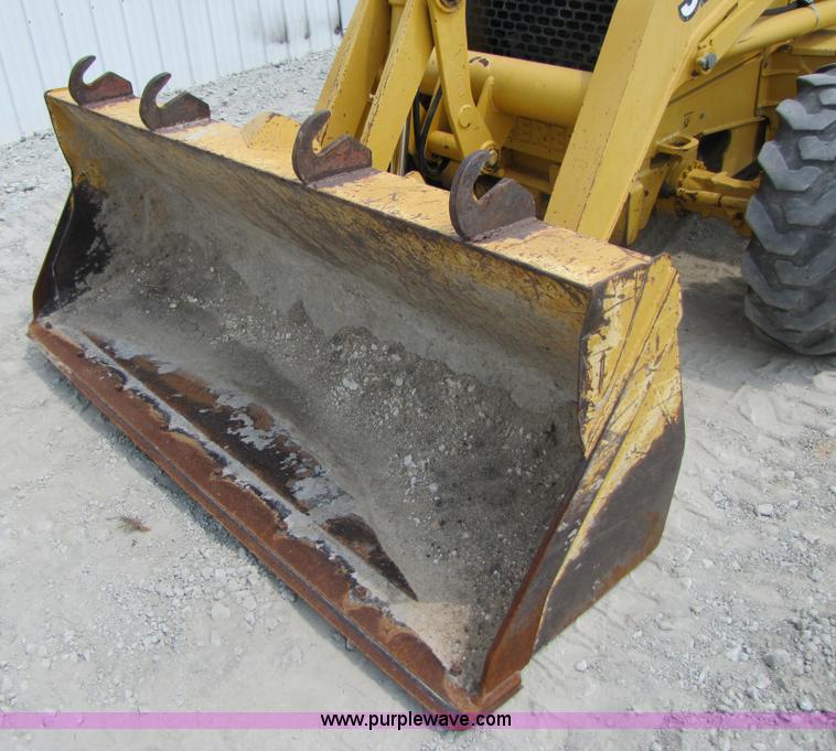 image for item 3460 2002 John Deere 310SG backhoe