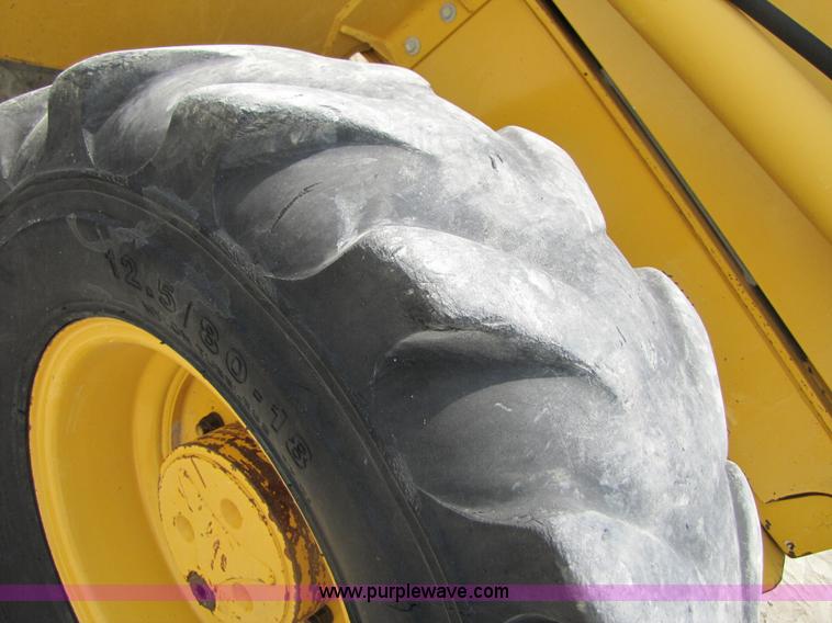 image for item 3460 2002 John Deere 310SG backhoe