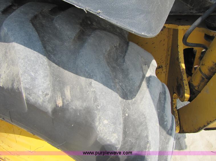 image for item 3460 2002 John Deere 310SG backhoe