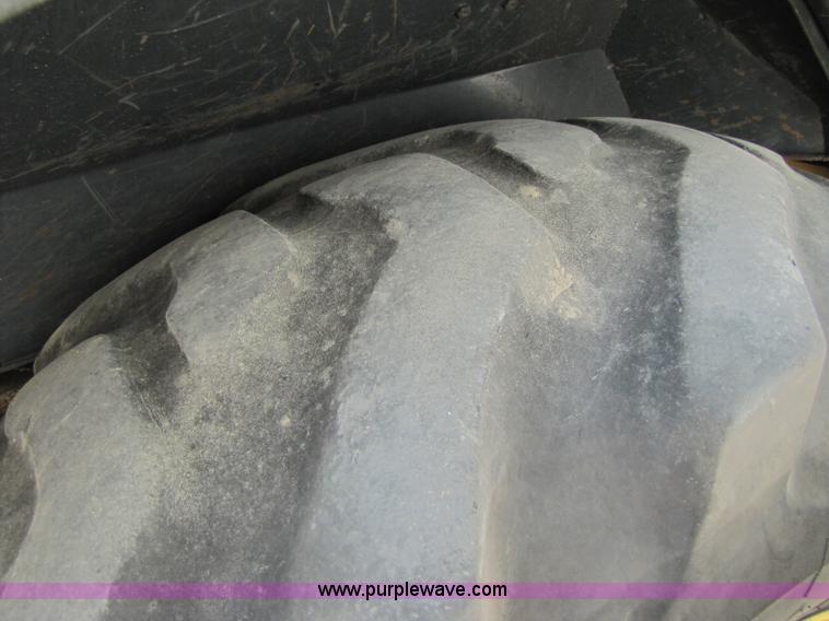 image for item 3460 2002 John Deere 310SG backhoe