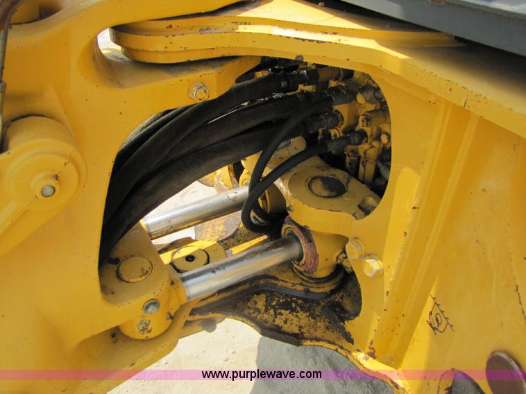 image for item 3460 2002 John Deere 310SG backhoe