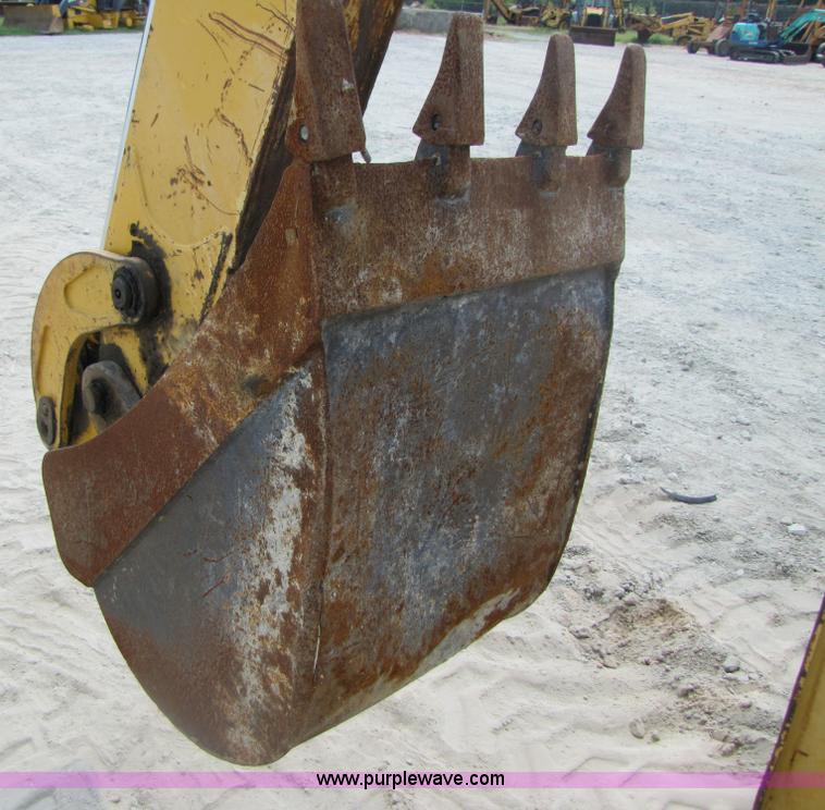 image for item 3460 2002 John Deere 310SG backhoe