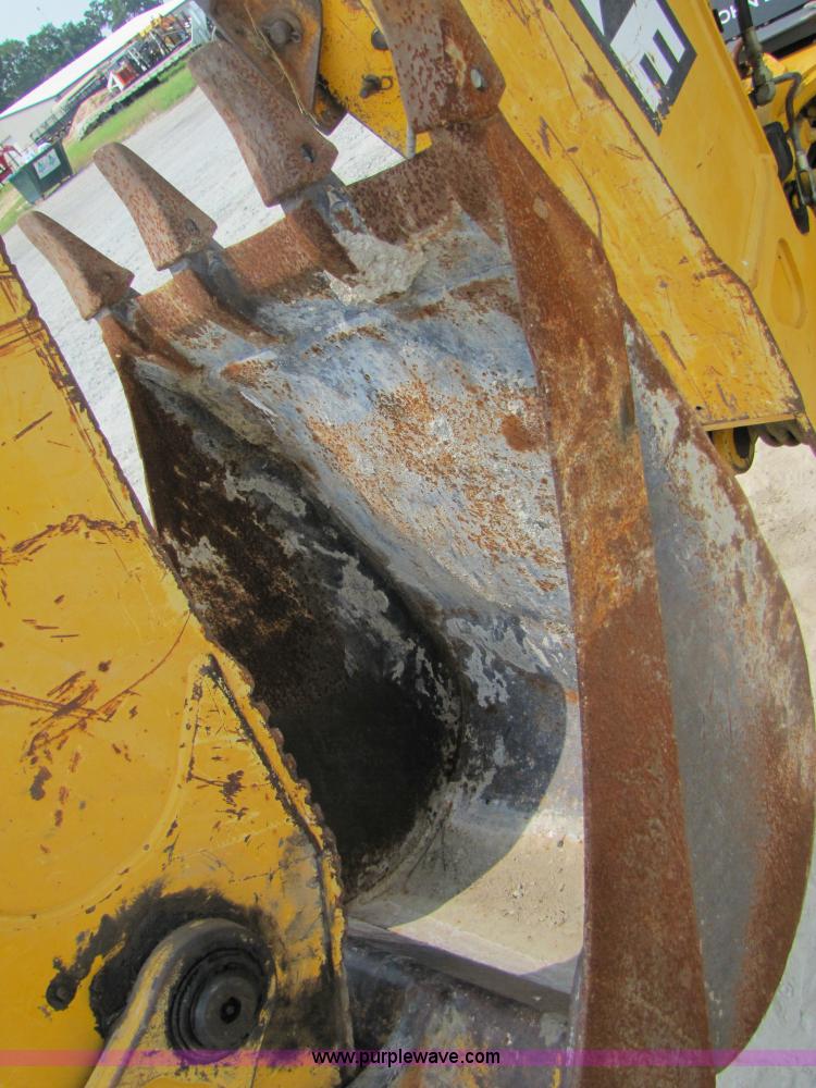 image for item 3460 2002 John Deere 310SG backhoe