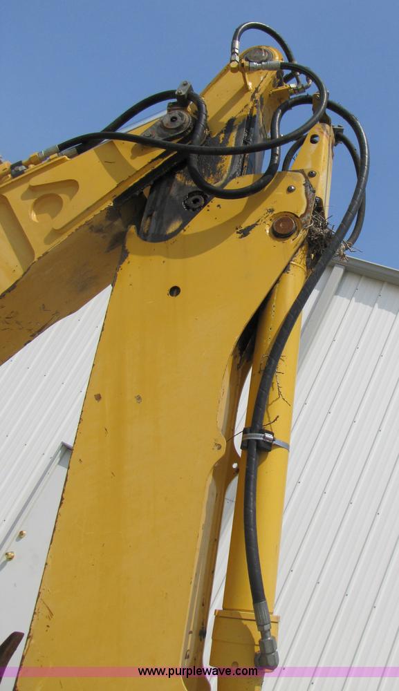 image for item 3460 2002 John Deere 310SG backhoe