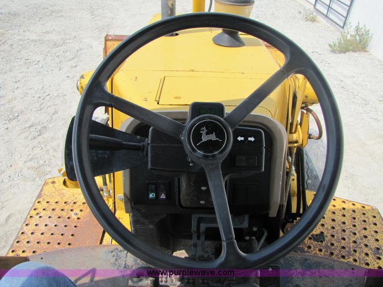 image for item 3461 1996 John Deere 310D backhoe