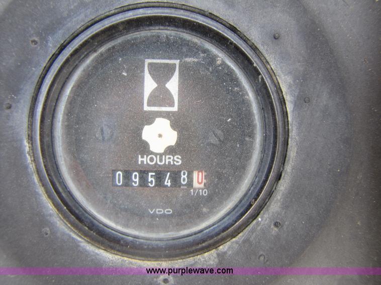 image for item 3461 1996 John Deere 310D backhoe