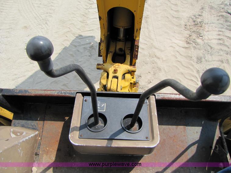 image for item 3461 1996 John Deere 310D backhoe