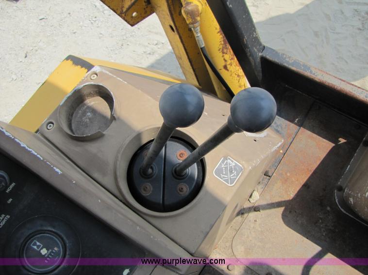 image for item 3461 1996 John Deere 310D backhoe