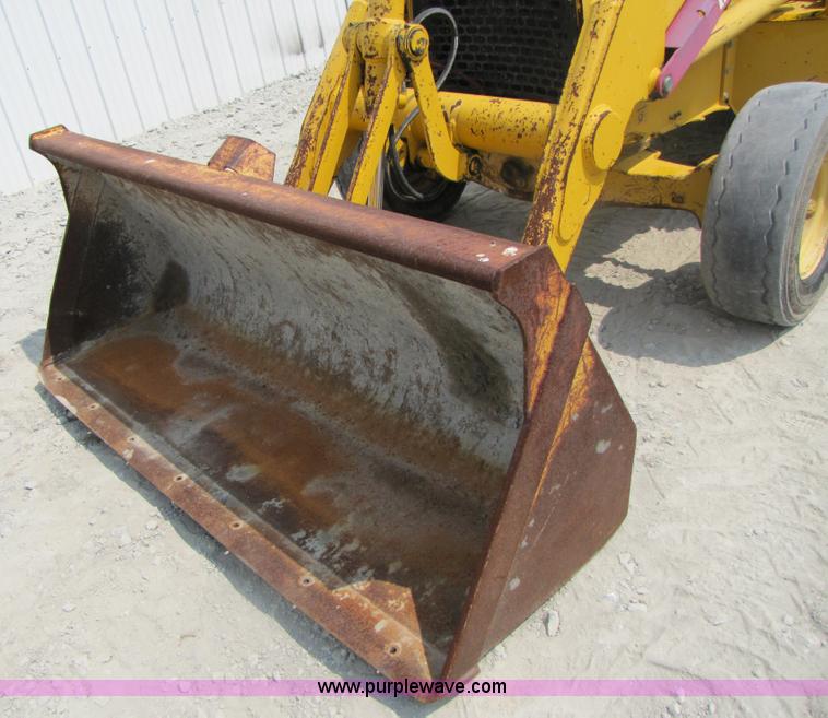 image for item 3461 1996 John Deere 310D backhoe