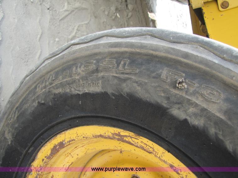 image for item 3461 1996 John Deere 310D backhoe