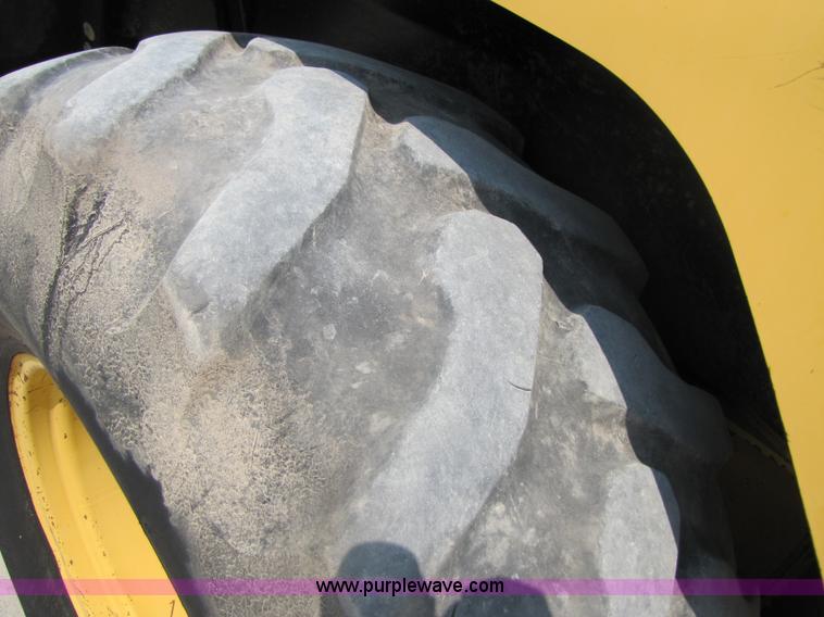 image for item 3461 1996 John Deere 310D backhoe