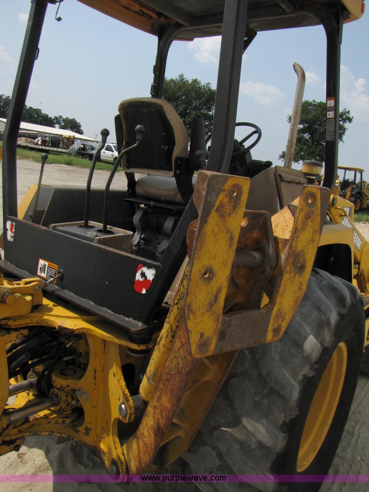 image for item 3461 1996 John Deere 310D backhoe