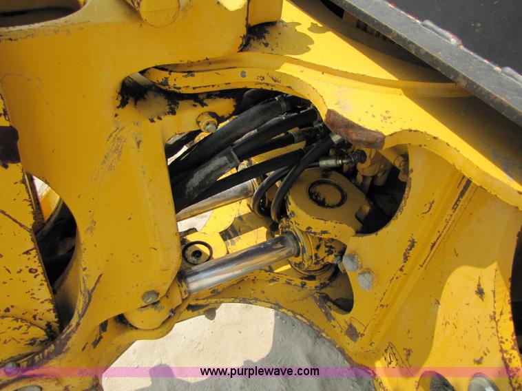 image for item 3461 1996 John Deere 310D backhoe