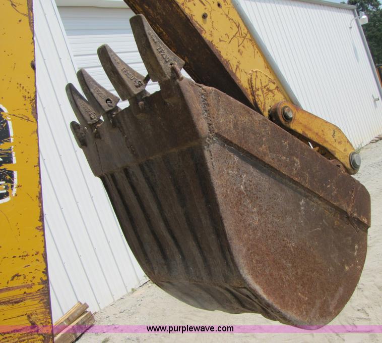 image for item 3461 1996 John Deere 310D backhoe
