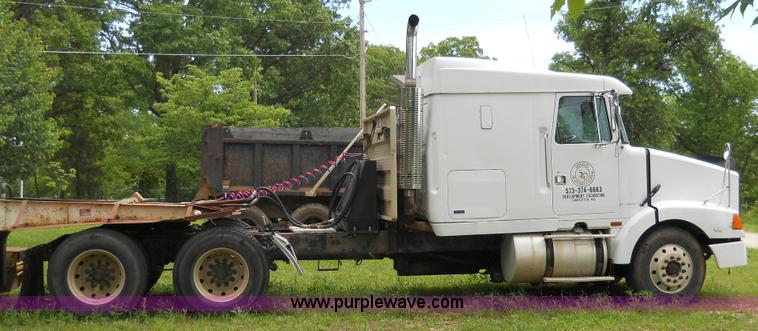 image for item 7872 1995 White GMC Aero WIA semi truck with triple axle trailer