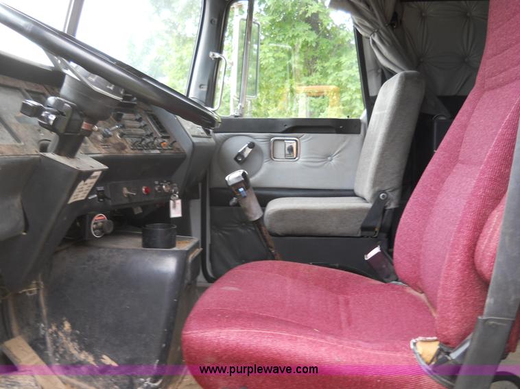 image for item 7872 1995 White GMC Aero WIA semi truck with triple axle trailer