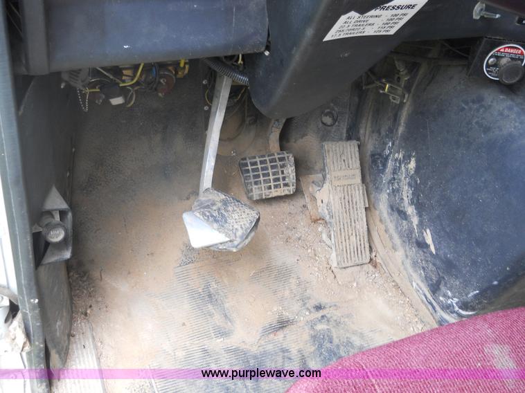 image for item 7872 1995 White GMC Aero WIA semi truck with triple axle trailer