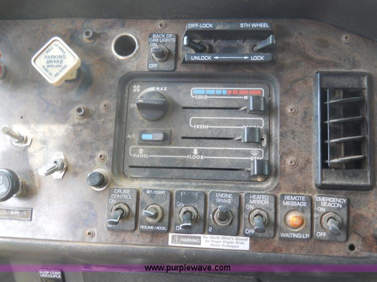 image for item 7872 1995 White GMC Aero WIA semi truck with triple axle trailer