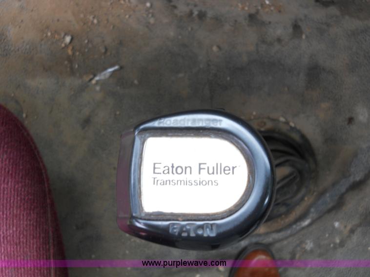 image for item 7872 1995 White GMC Aero WIA semi truck with triple axle trailer