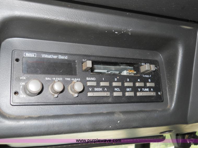 image for item 7872 1995 White GMC Aero WIA semi truck with triple axle trailer