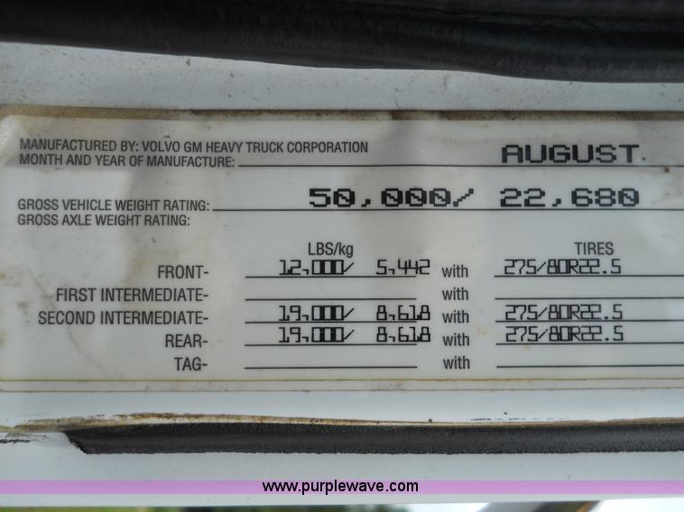 image for item 7872 1995 White GMC Aero WIA semi truck with triple axle trailer