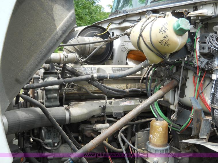 image for item 7872 1995 White GMC Aero WIA semi truck with triple axle trailer