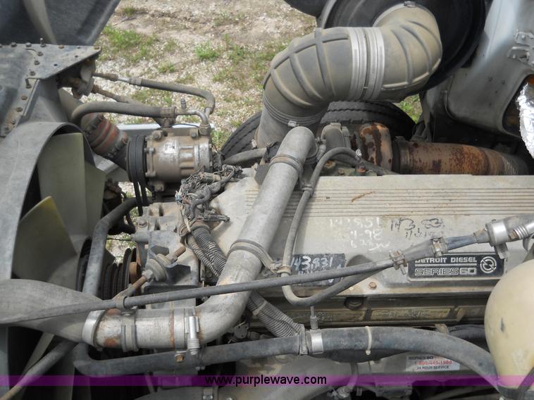 image for item 7872 1995 White GMC Aero WIA semi truck with triple axle trailer