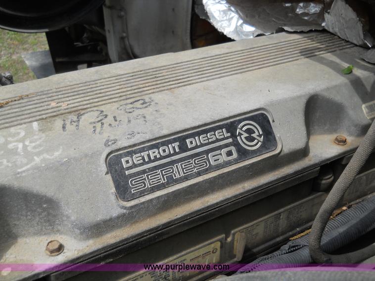 image for item 7872 1995 White GMC Aero WIA semi truck with triple axle trailer