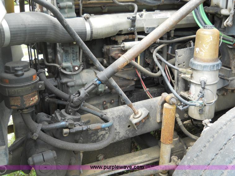 image for item 7872 1995 White GMC Aero WIA semi truck with triple axle trailer