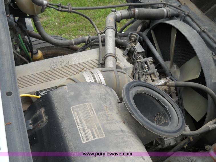 image for item 7872 1995 White GMC Aero WIA semi truck with triple axle trailer