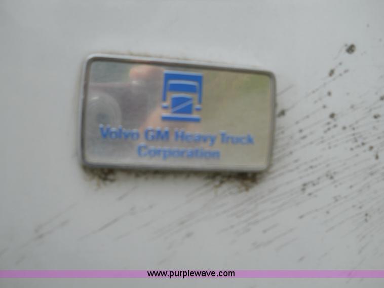 image for item 7872 1995 White GMC Aero WIA semi truck with triple axle trailer