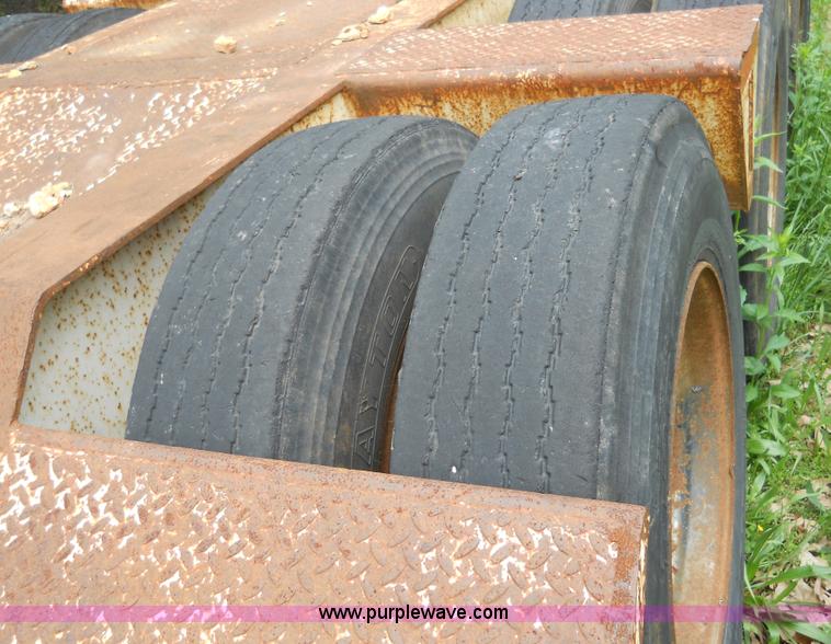 image for item 7872 1995 White GMC Aero WIA semi truck with triple axle trailer