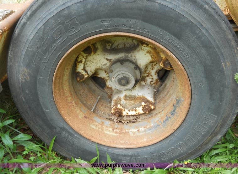 image for item 7872 1995 White GMC Aero WIA semi truck with triple axle trailer