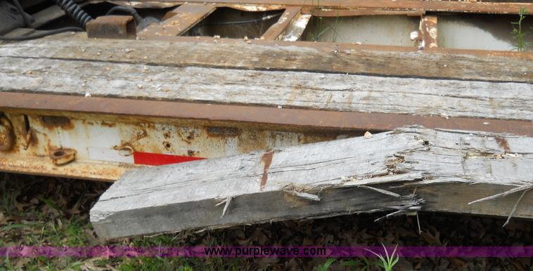 image for item 7872 1995 White GMC Aero WIA semi truck with triple axle trailer